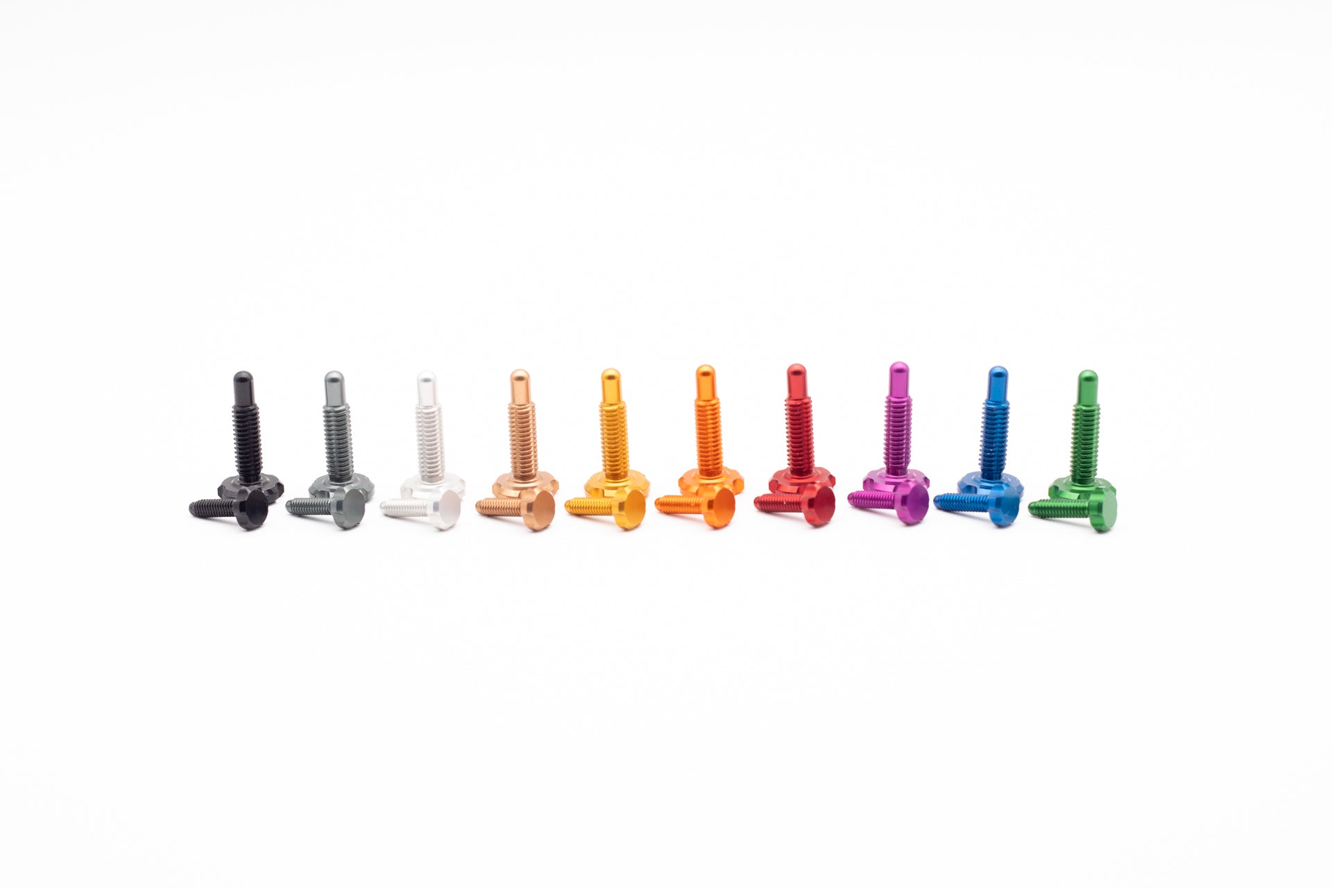 Ten pairs of hex-head mountain bike screws in various lengths and colors, from black to green, on white background.