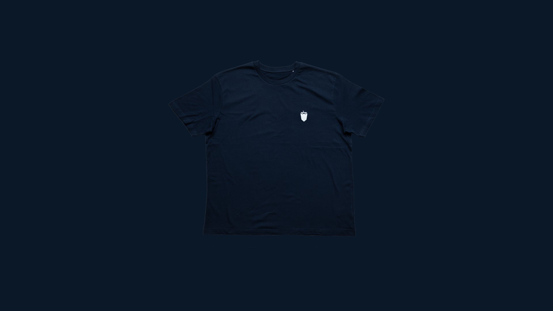 Navy blue mountain biking T-shirt with white acorn logo on left chest, laid on blue background