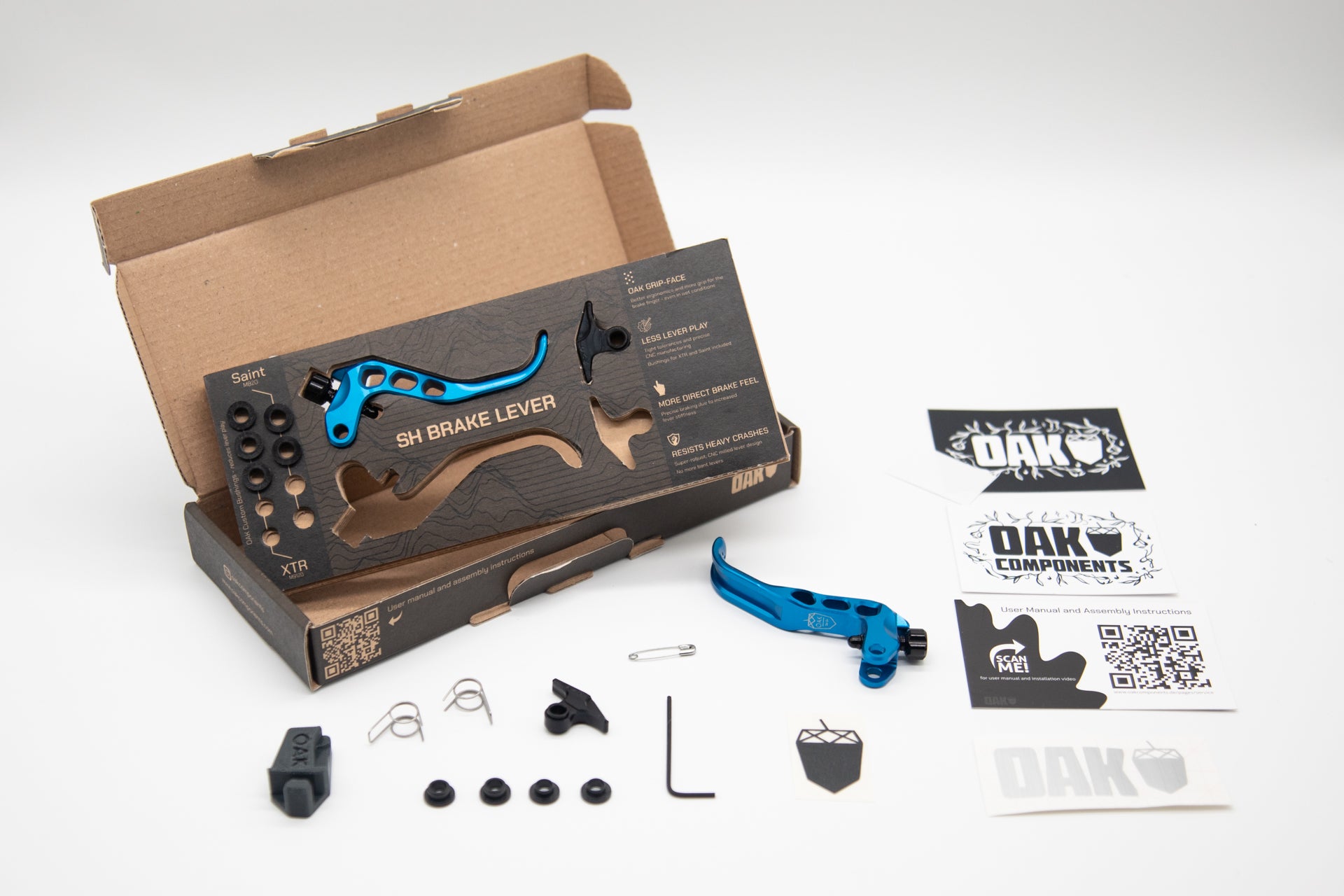 Blue SH brake lever in a custom box, featuring ergonomic design and CNC-milled construction for mountain bikes
